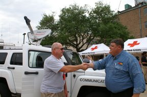 Danny KD4RAA meets with the local Red Cross Communications Officer and the newly donated Red Cross Communications Vehicle